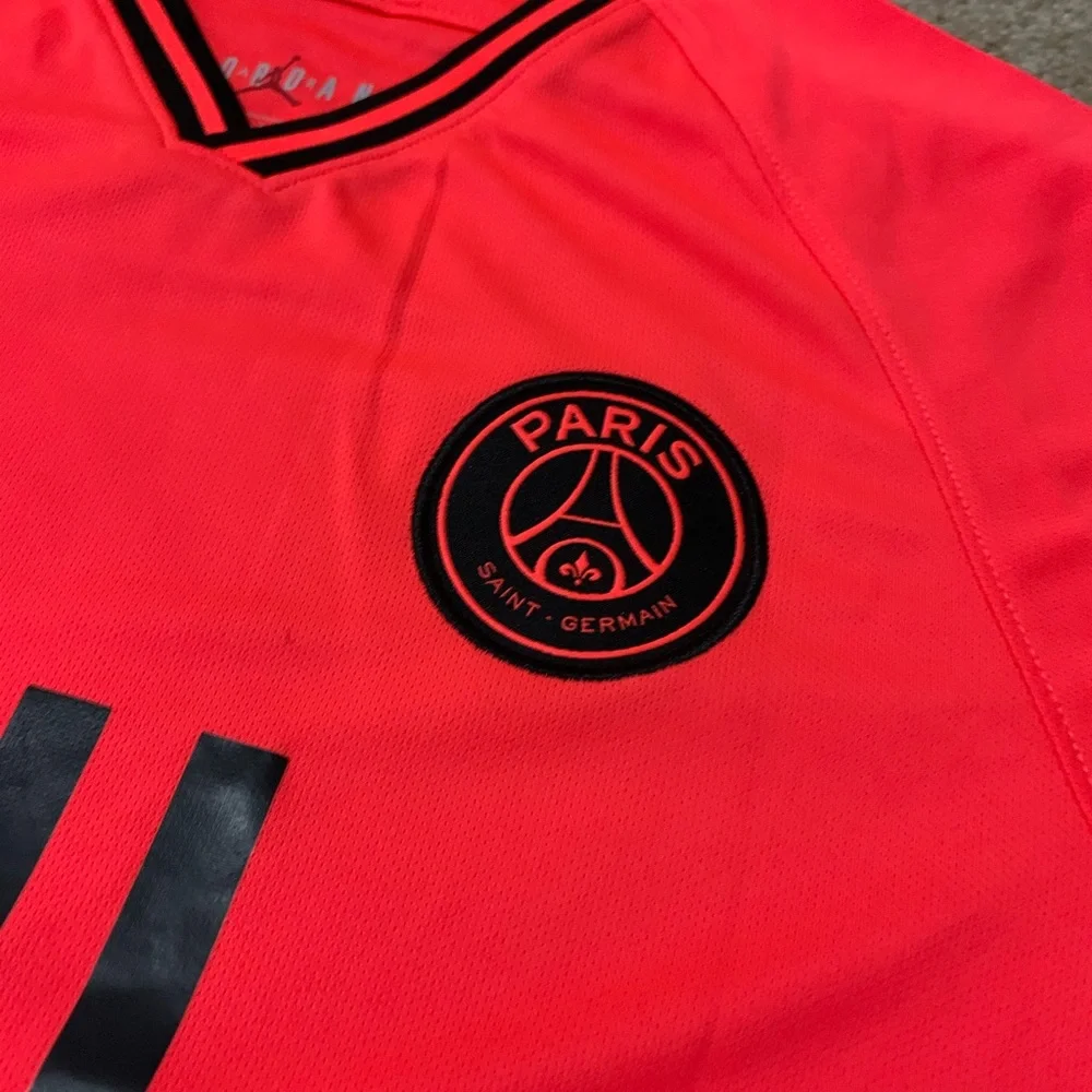 Jordan Men’s Mbappé #7 Short Sleeve Jersey - Neon Coral with Black Accents